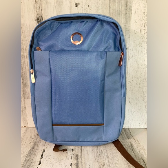 DELSEY Handbags - NWOT- Delsey Paris Ramey Sky Blue w/ Rose Gold 14L Travel Backpack #B3